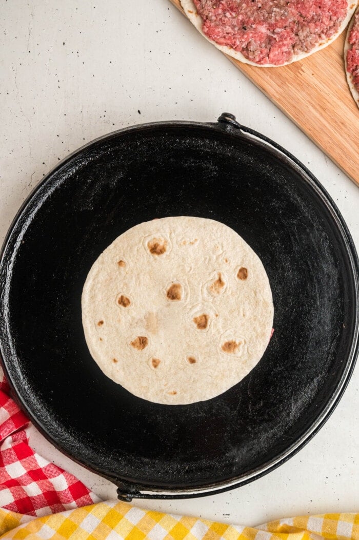 smashburger taco in the skillet burger side down