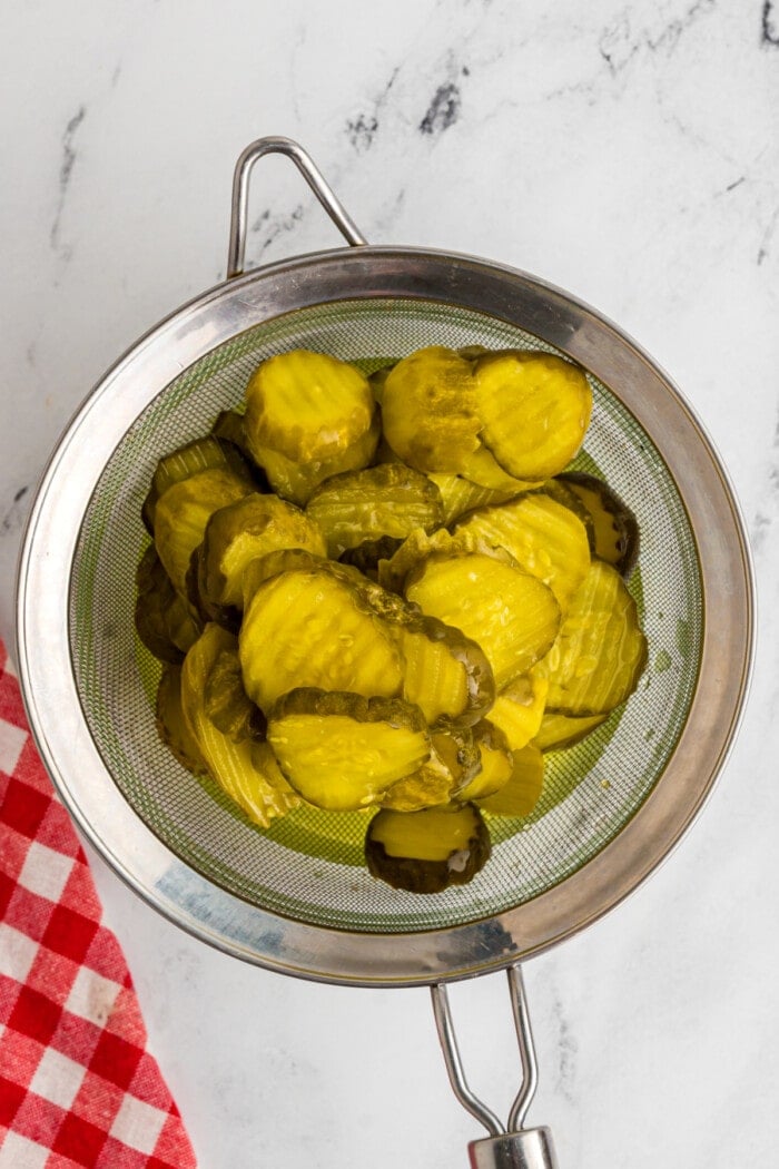 pickles in strainer