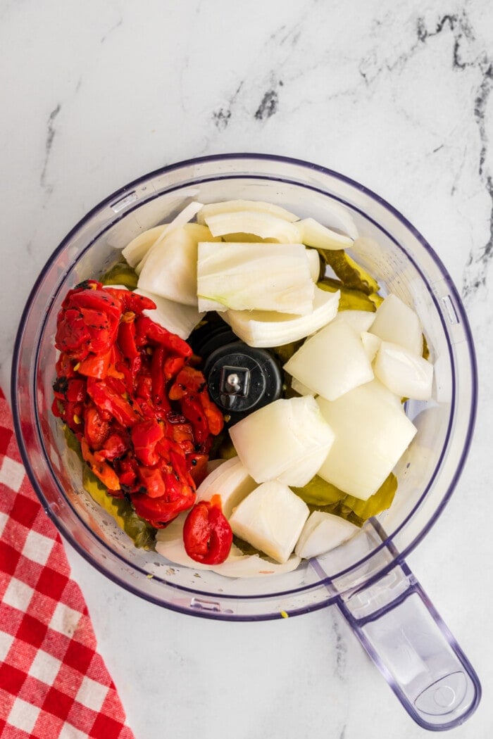 pickles, roasted red peppers and onions in food processor to make hot dog relish