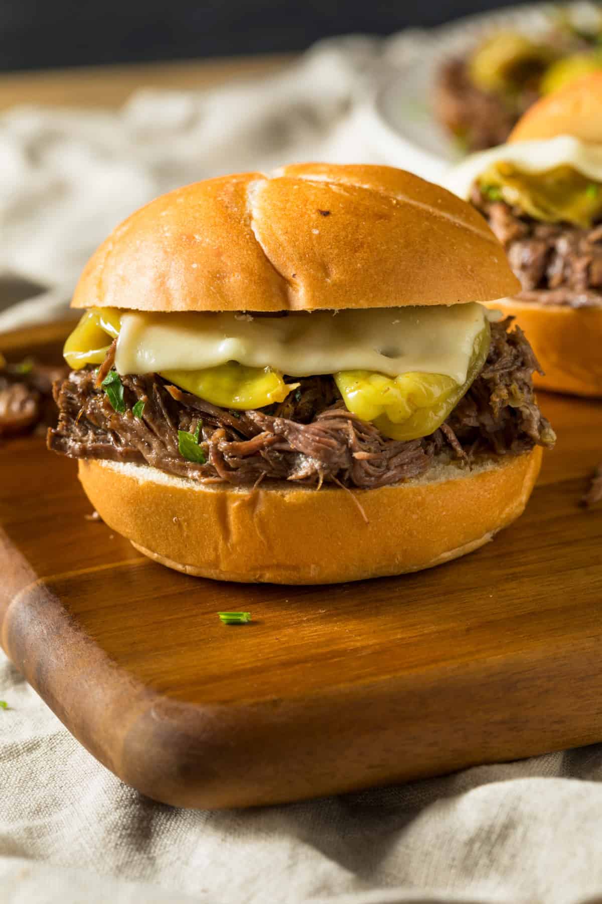 This easy Mississippi Pot Roast recipe is 100% the best! Made with only 5 ingredients and perfect with fluffy mashed potatoes. Mississippi Pot Roast Sandwich