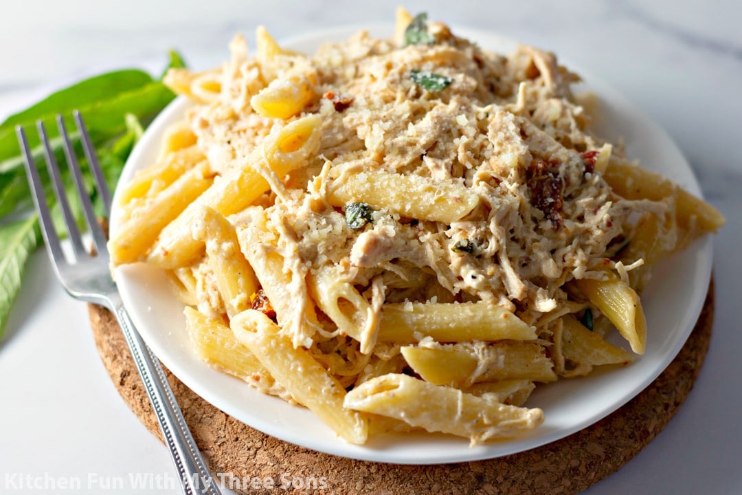Slow Cooker Olive Garden Chicken Pasta on a white plate